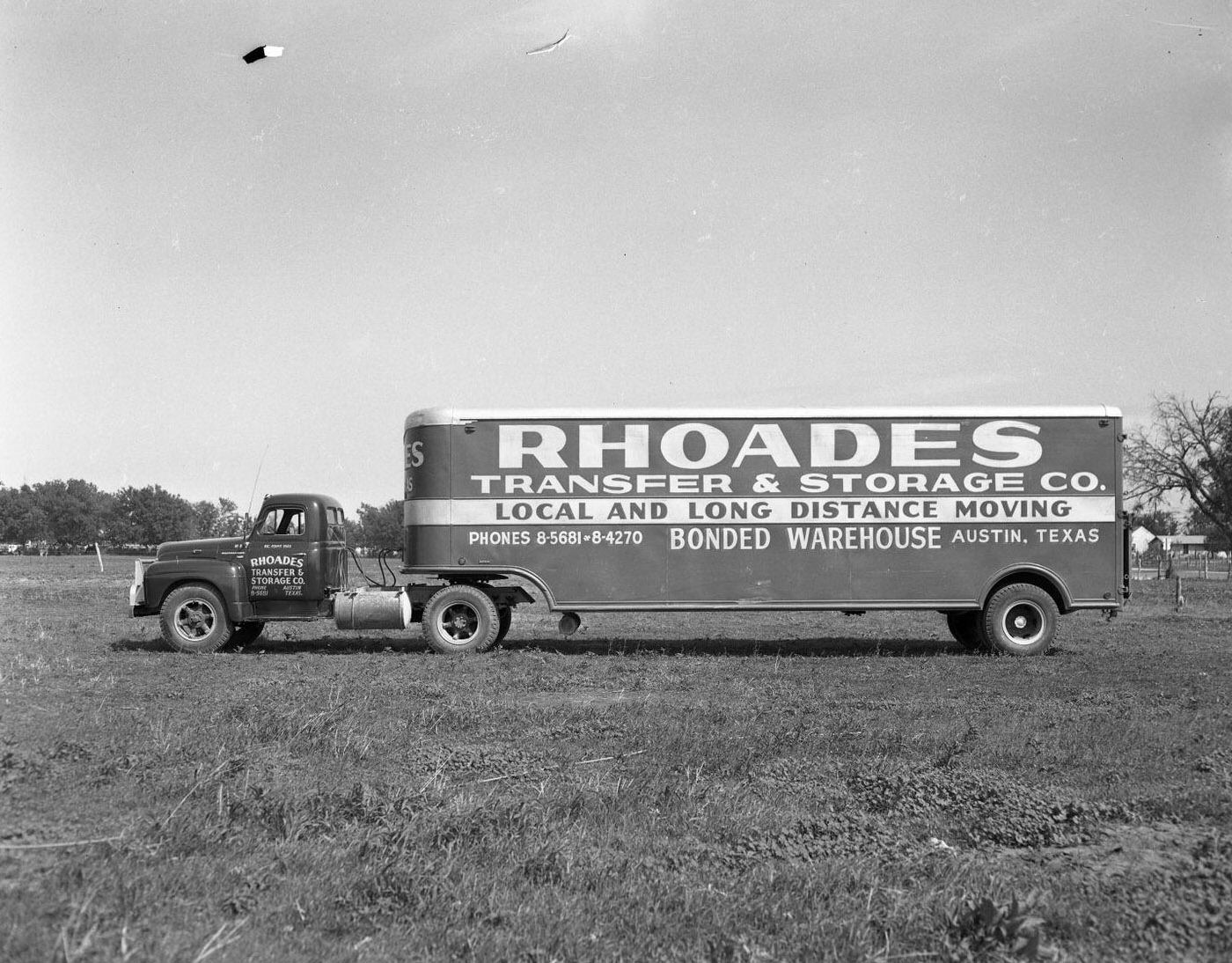 Rhoades Truck Lines, Portrait of Rhoades Transfer & Storage Co. Truck, 1951.