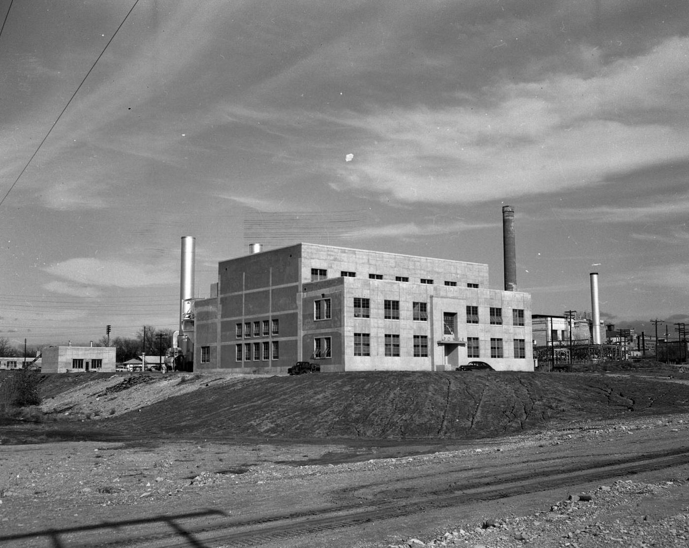 Seaholm Power Plant, Unfinished Surroundings and Parked Cars, 1951.