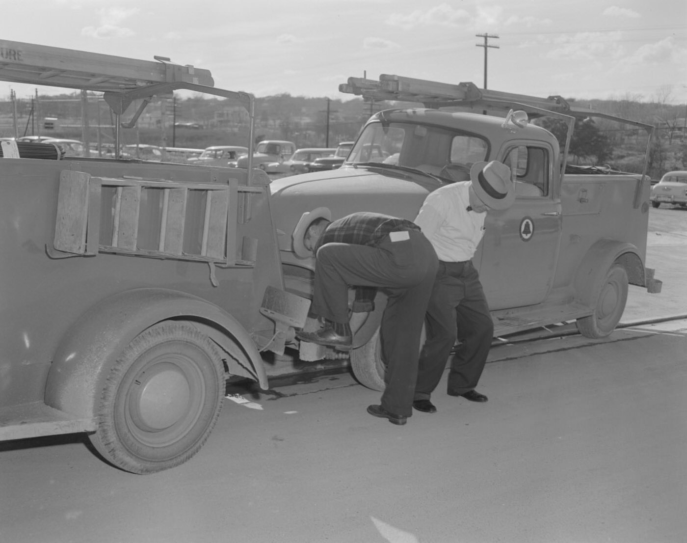 Men Demonstrating Vehicle Accidents, 1958.