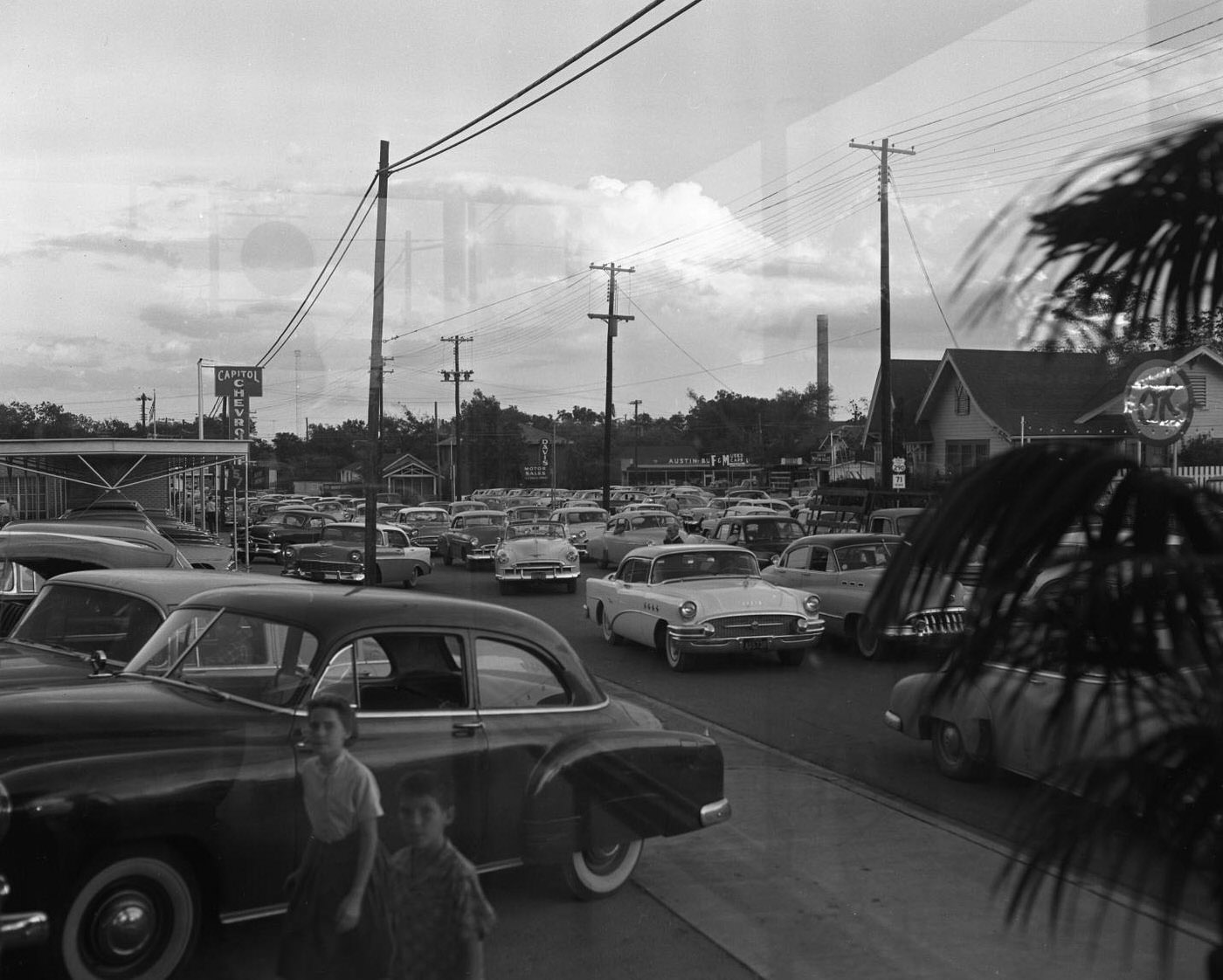 Mother and Son at Capitol Chevrolet Lot, 1956.