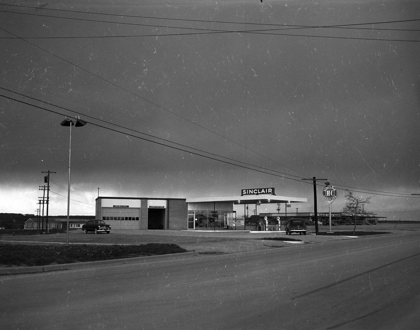 Sinclair Gasoline Station, Allendale Village Shopping Center in Background, 1950.
