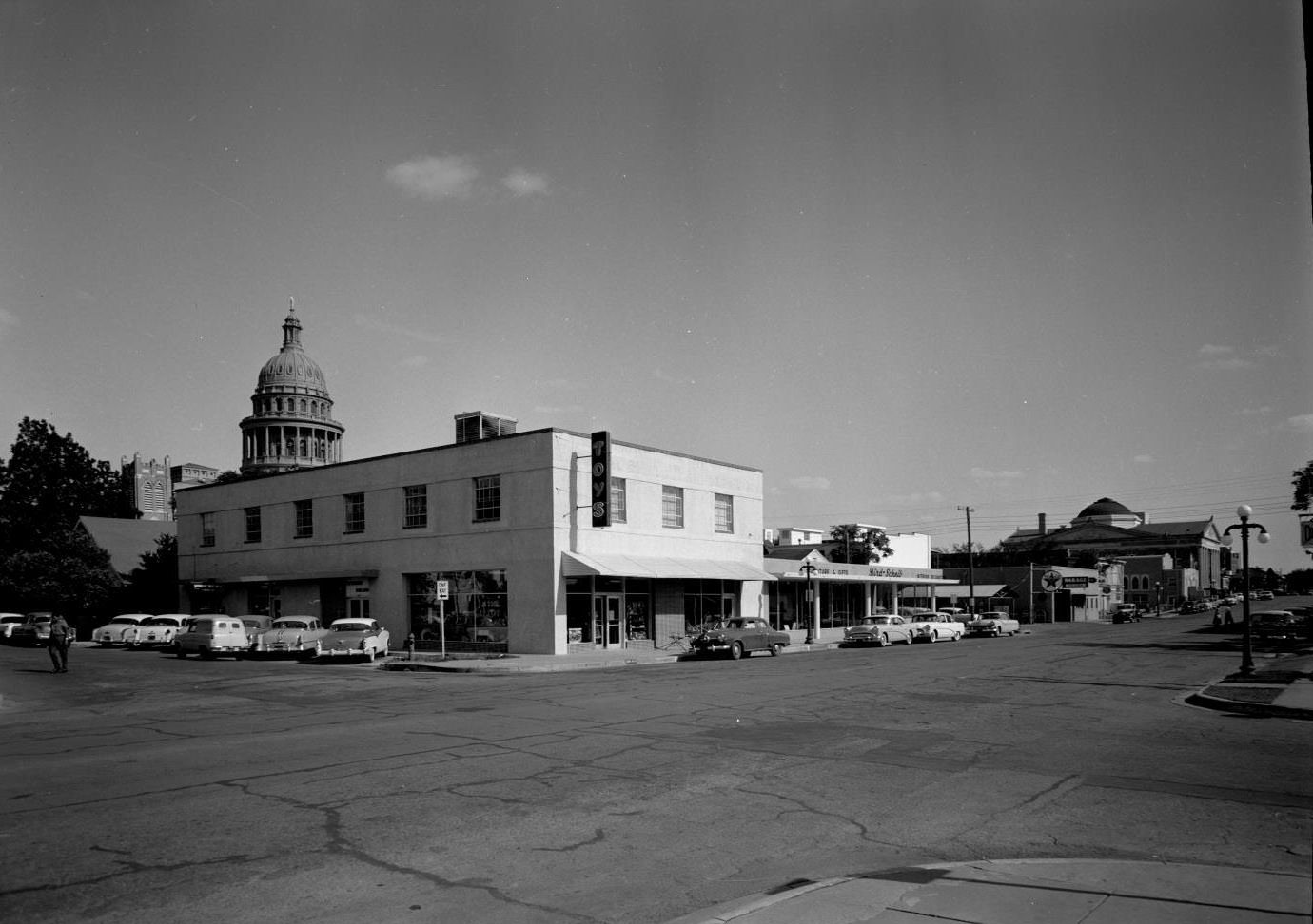 Exterior of Toy Palace Toy Store with Capitol Building in Background, 1956.