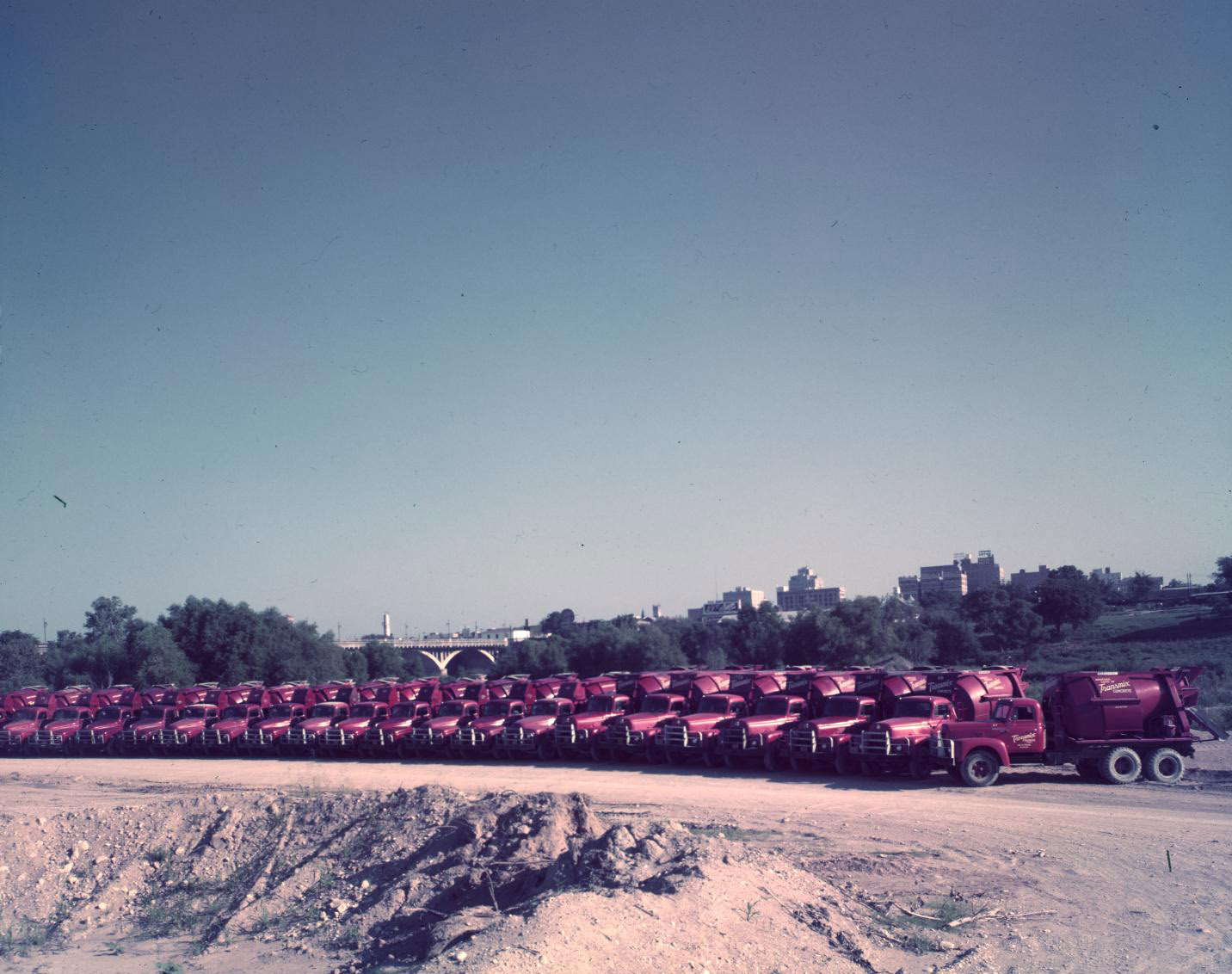 Transmix Cement Company Trucks by Congress Avenue Bridge, 1951.