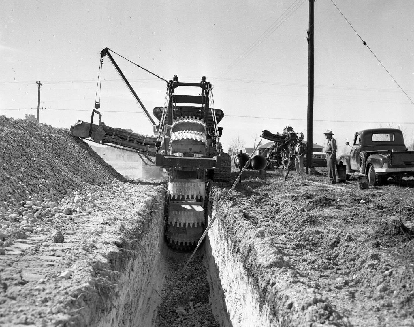 View from Inside Dugout Trench with Trench-Digging Machinery, 1951.