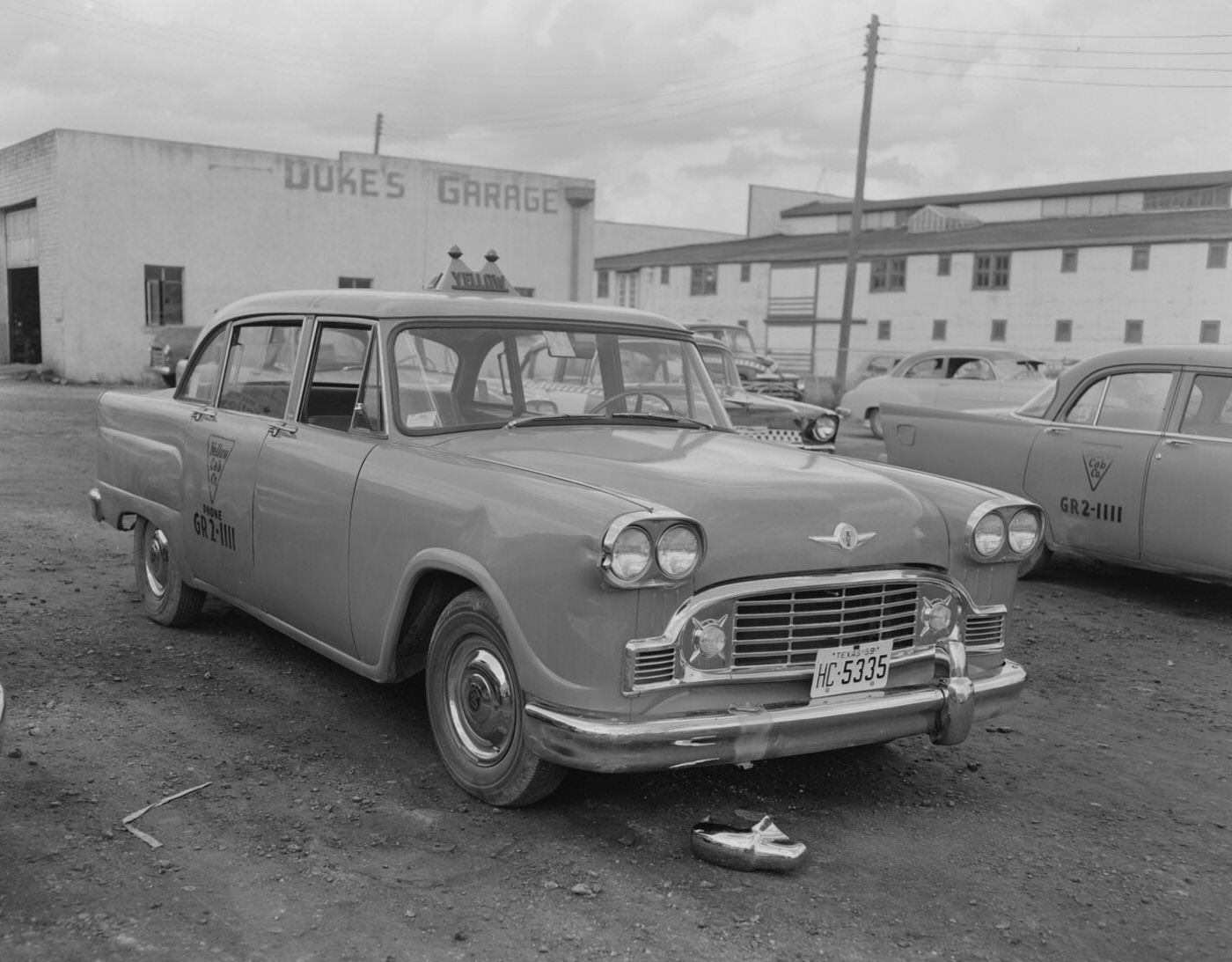 Yellow Cab Company Cabs Near Duke's Garage, 1959.