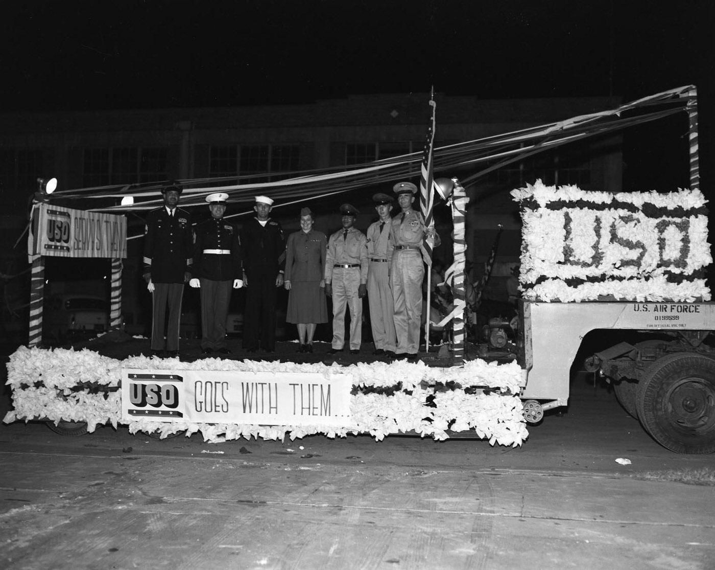 United Fund Parade with Military Personnel on USO Float, 1956.