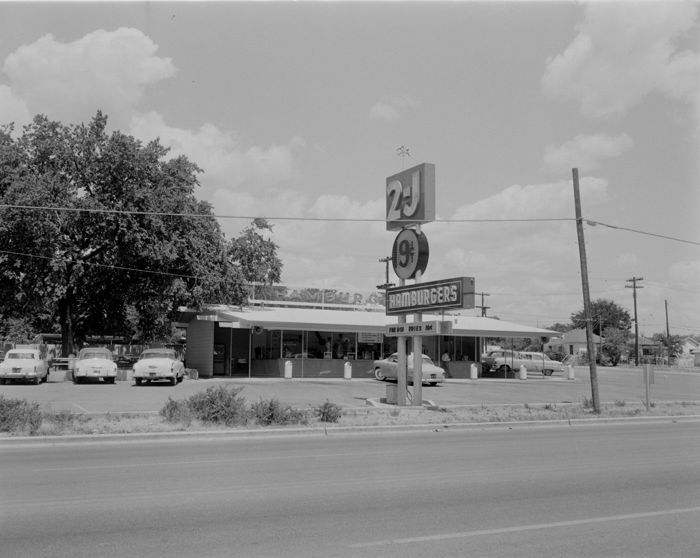 Exterior of 2-J Hamburger Store with Cars Parked, 1954.