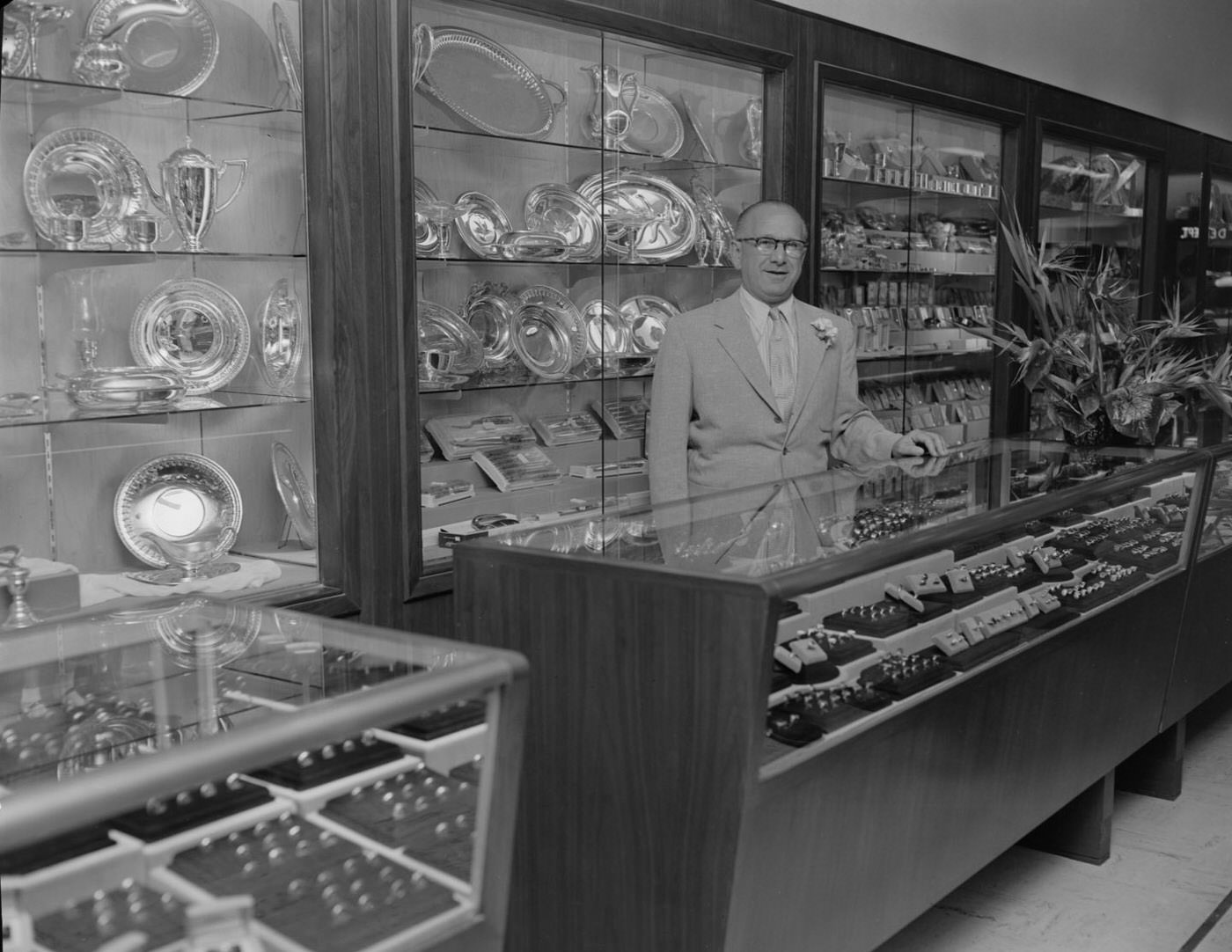 Zales Jewelers with Man Behind Counter, 1953.