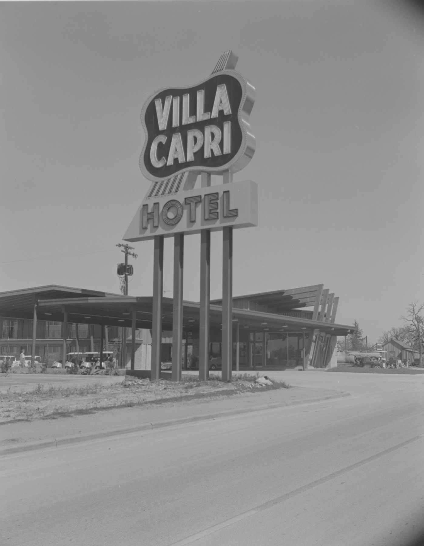 Exterior of Villa Capri Hotel Sign and Building, 1959.