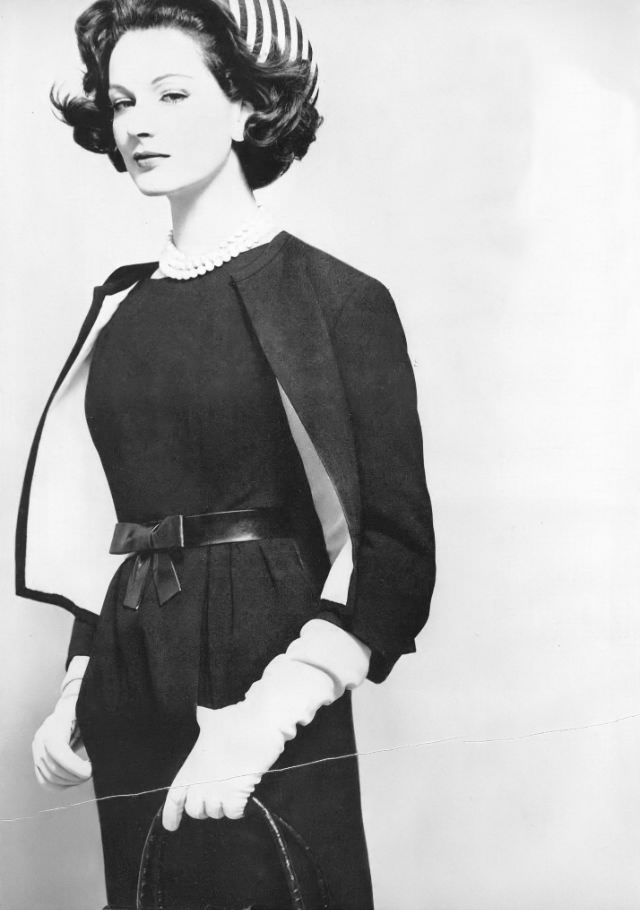 Betsy Pickering in black crêpe cardigan suit by Ben Zuckerman, 1959