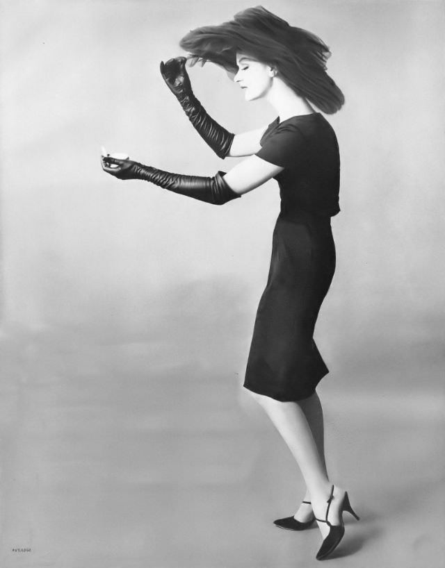 Betsy Pickering in black silk crêpe dress by A. Goodman, 1959