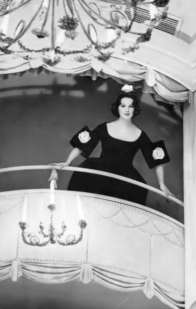 Betsy Pickering in short black faille evening dress by Patrick de Barentzen, 1959