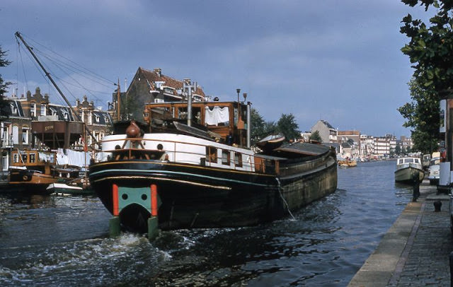 Boat on canal, Amsterdam, Netherlands,  1961