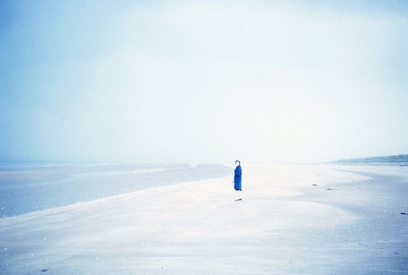 Lady on Normandy beach, circa 1965