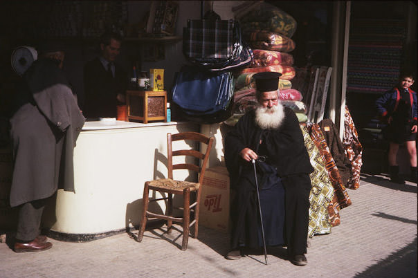 An elderly man stops for a rest, Iraklion, Crete, Greece, April 3, 1965