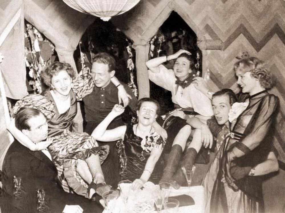 Eva Braun (far right) celebrates carnival time at her parents house in Munich, Germany, 1938. Among the group are her mother Franziska Katharina (center) and her sisters Ilse and Margarethe.