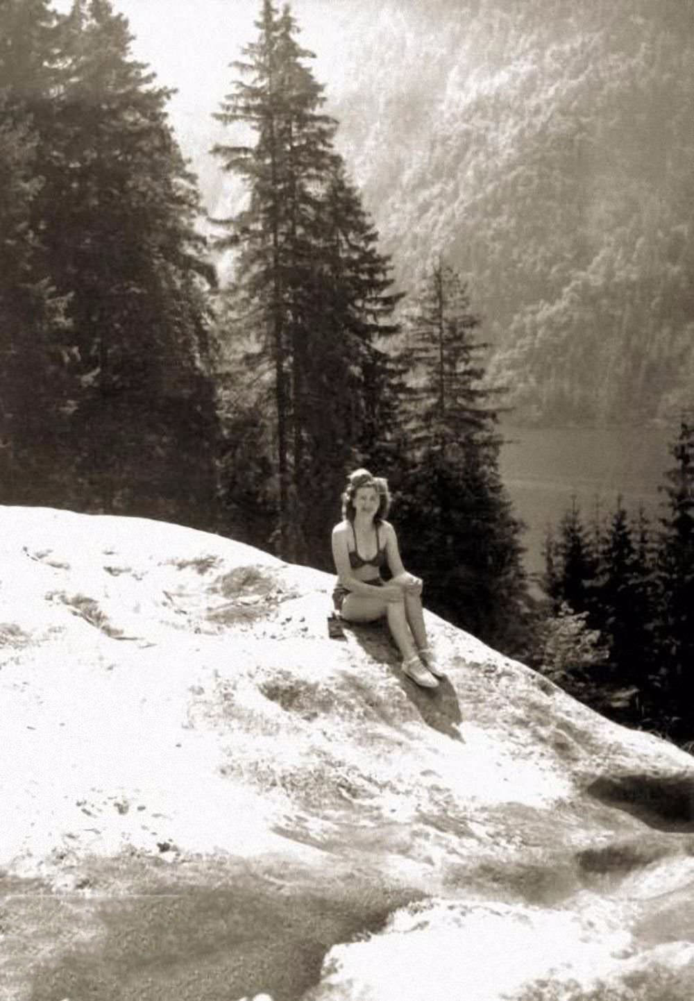 Hitler disapproved of some of Braun's habits such as smoking, wearing makeup, skinny dipping, and nude sunbathing. Here, Braun, in a bathing suit, relaxes by Konigssee lake in 1940.