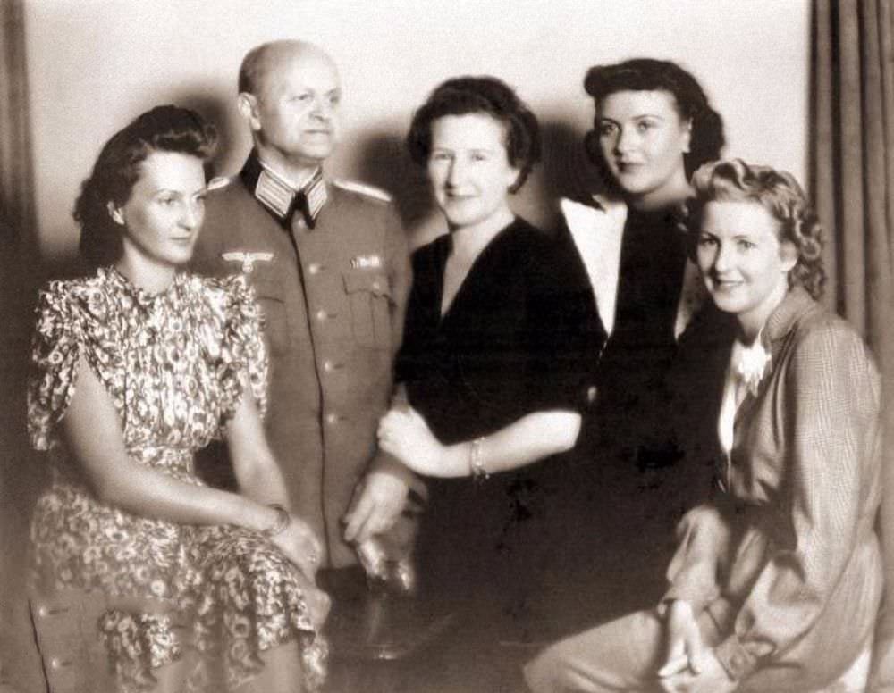 Eva Braun (far right) with her parents, Friedrich "Fritz" and Franziska, and her sisters Ilse (left) and Gretl, 1940.