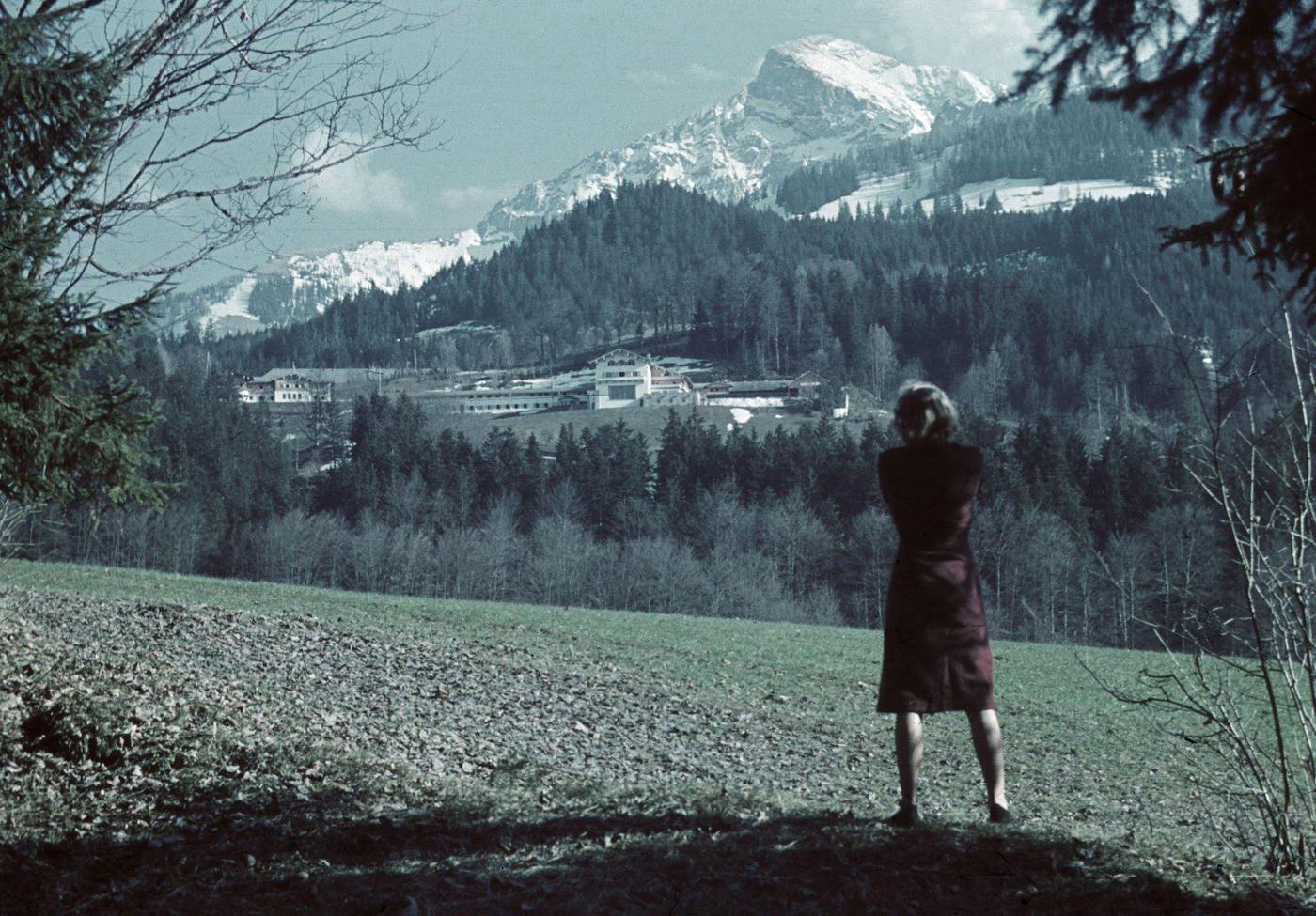 Eva Braun takes a photograph of Hitler's Bavarian retreat, Obersalzberg near Berchtesgaden, Germany, circa 1940