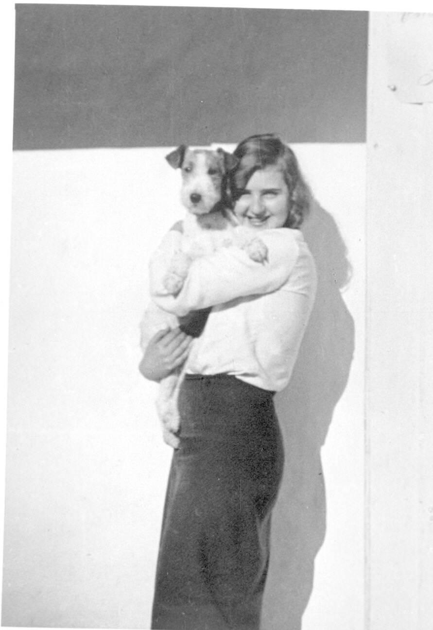Eva Braun holding a dog, 1932