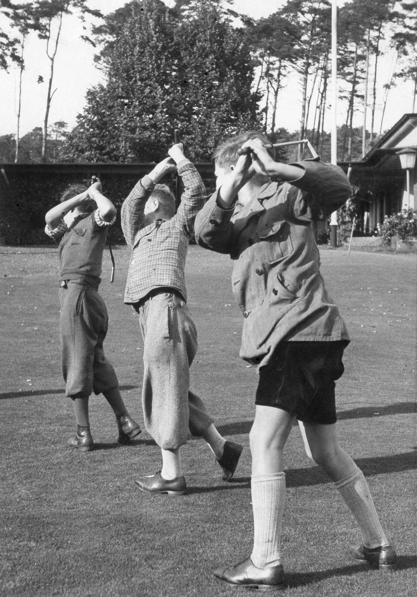 Young women of 'Faith and Beauty Society' doing gymnastics