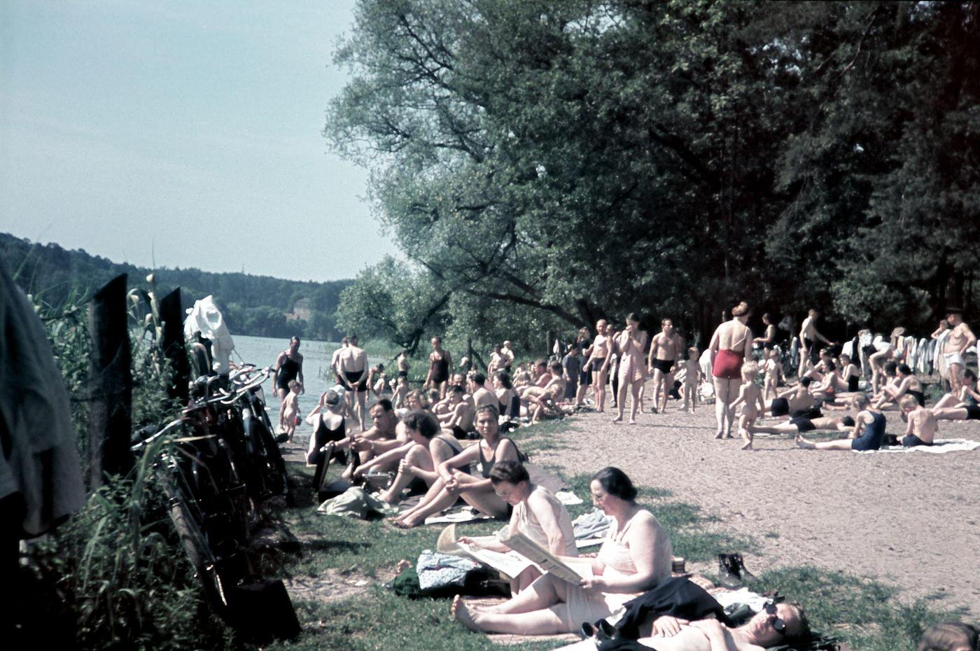 Beauty care and cosmetic treatment courses organized by the German Labour Front, students training facial massage, 1940.