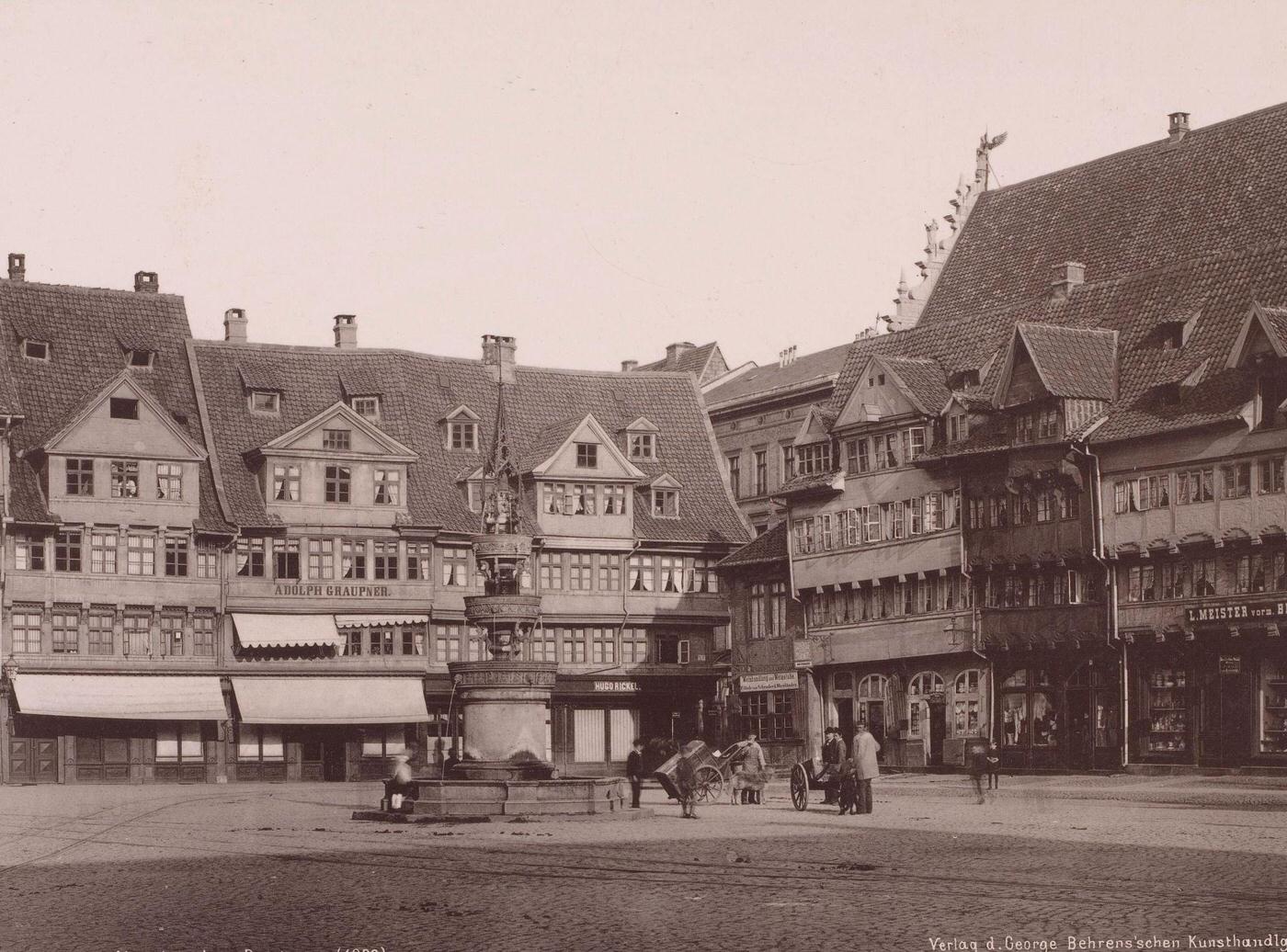 Altstadtmarkt and Poststrasse, Braunschweig, Germany. Historic square with houses, fountain, people, carts. George Behrens, 1886.