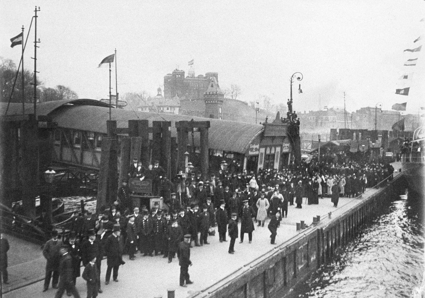 People waiting at the port, Hamburg, district of St. Pauli.