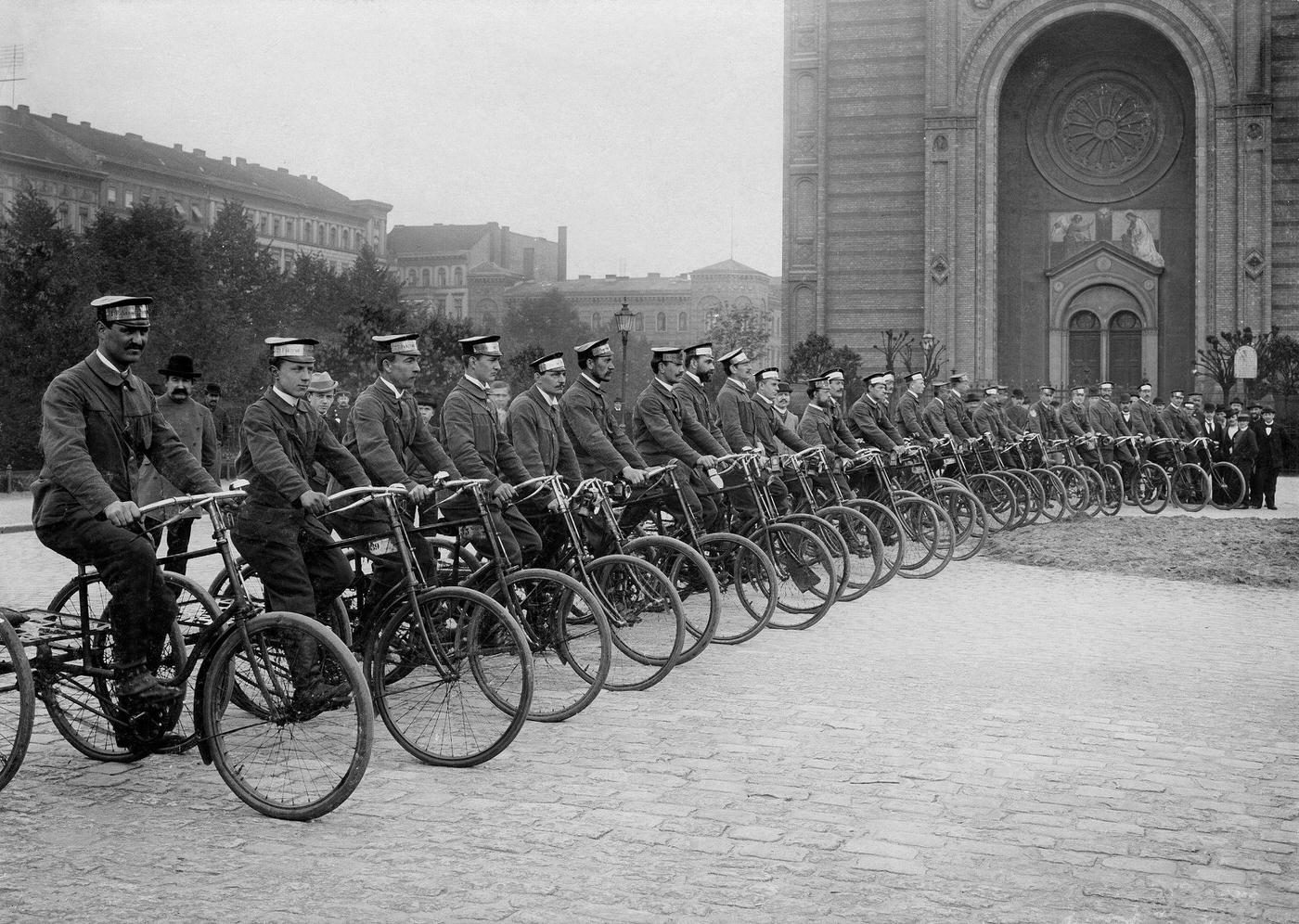 Group of 'service staff' on bicycles in Berlin, Germany, 1897