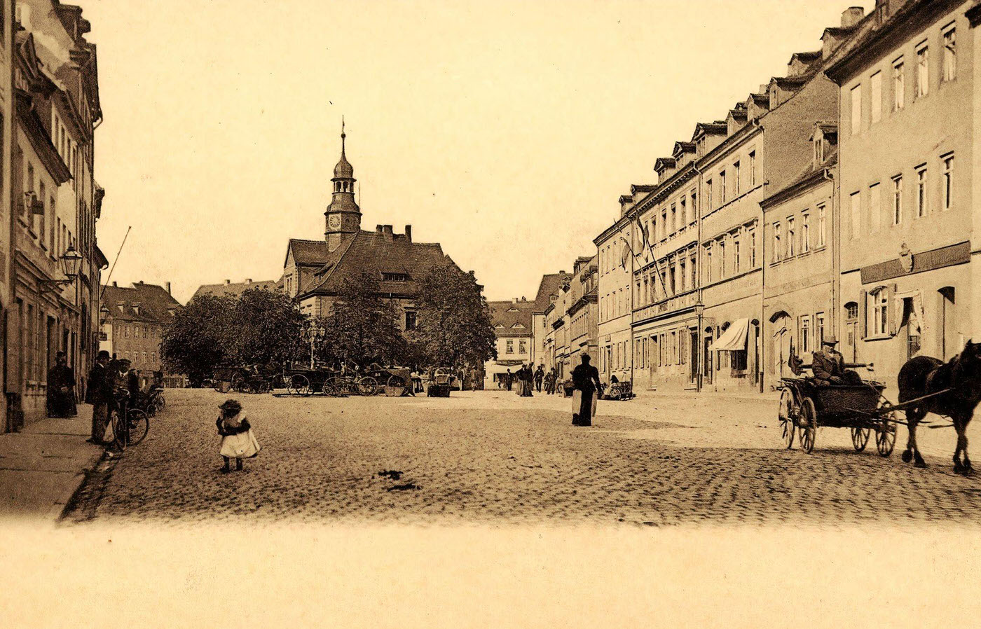 Horses, carriages, town halls, Bicycles in Ronneburg, Thuringia, Germany, 1903.