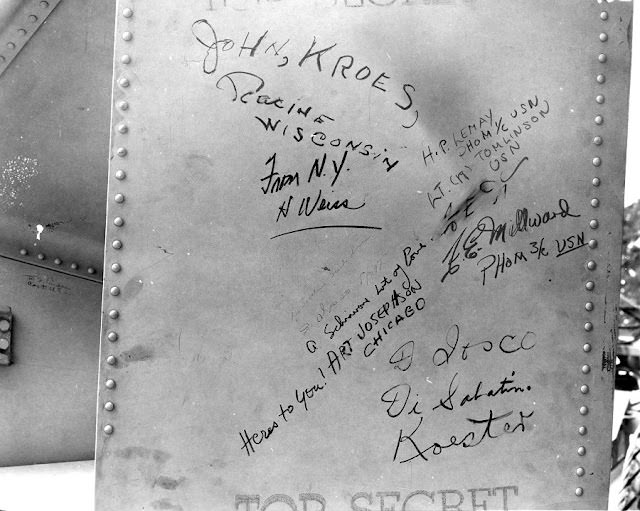 Signatures on Fat Man's tail assembly. You can see the small signature of "W. S. Parsons, USN" or Enola Gay weaponeer Deak Parsons, to the far left.