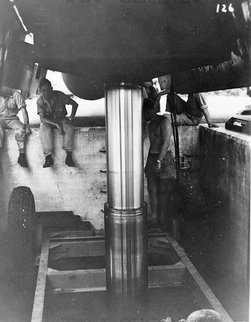 A view from underneath the hydraulic lift, in the bomb bay.