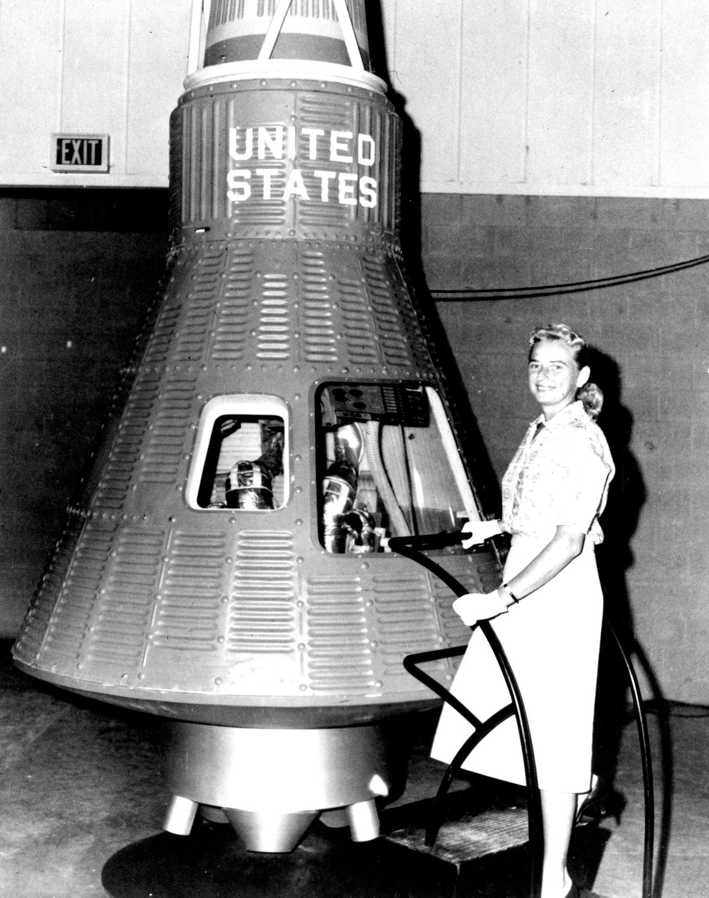 Jerrie Cobb next to Mercury Spaceship Capsule, 1950
