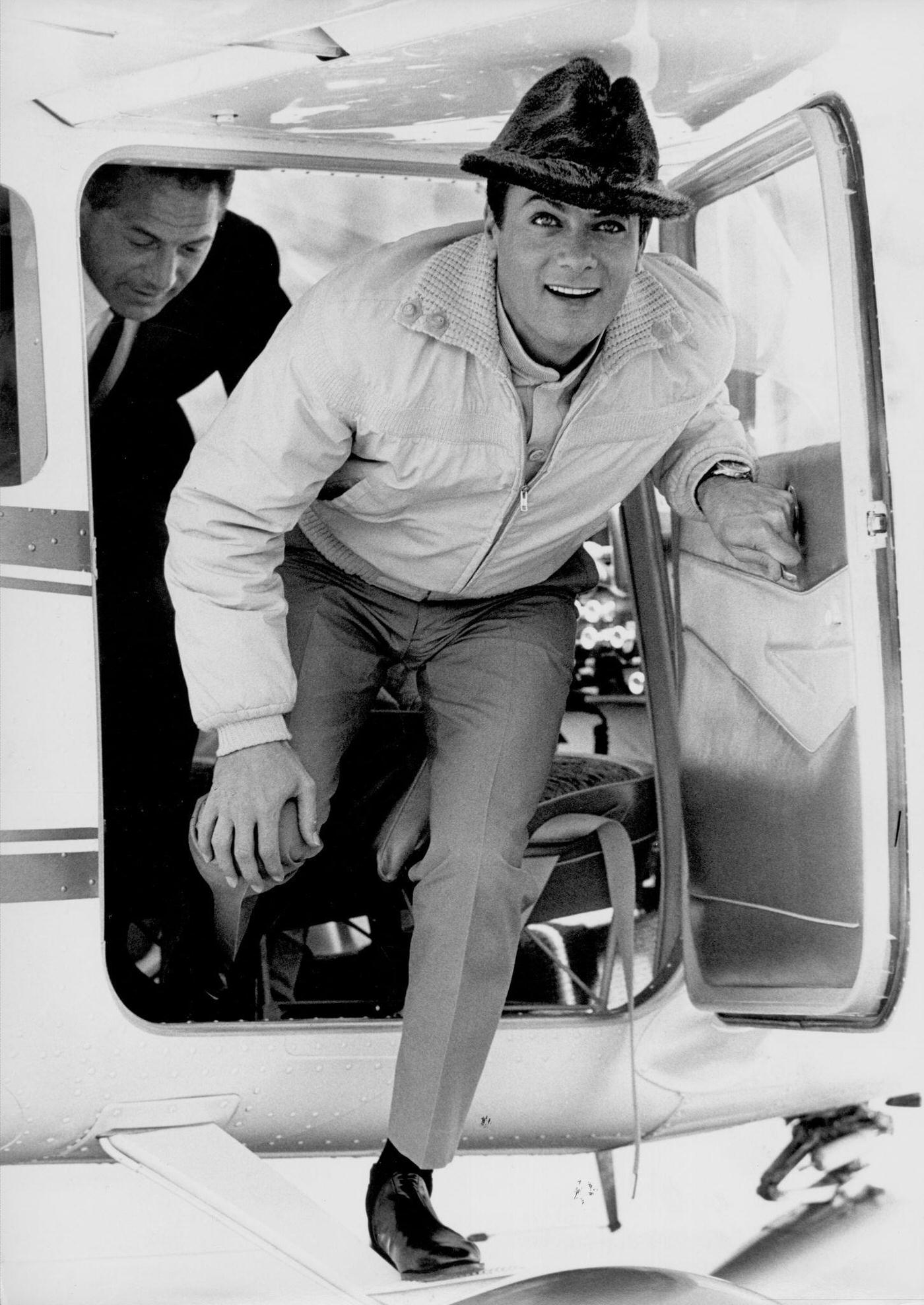 Tony Curtis Exits Plane in Nevada While Filming "40 Pounds of Trouble," 1961