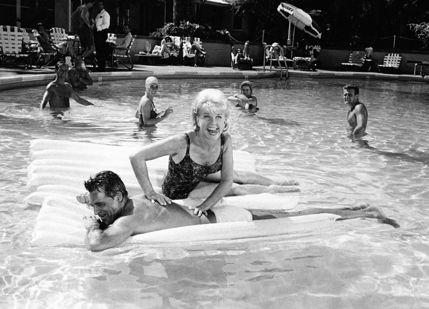 Doris Day and Cary Grant in the Pool While Filming "A Touch of Mink," Los Angeles, 1961