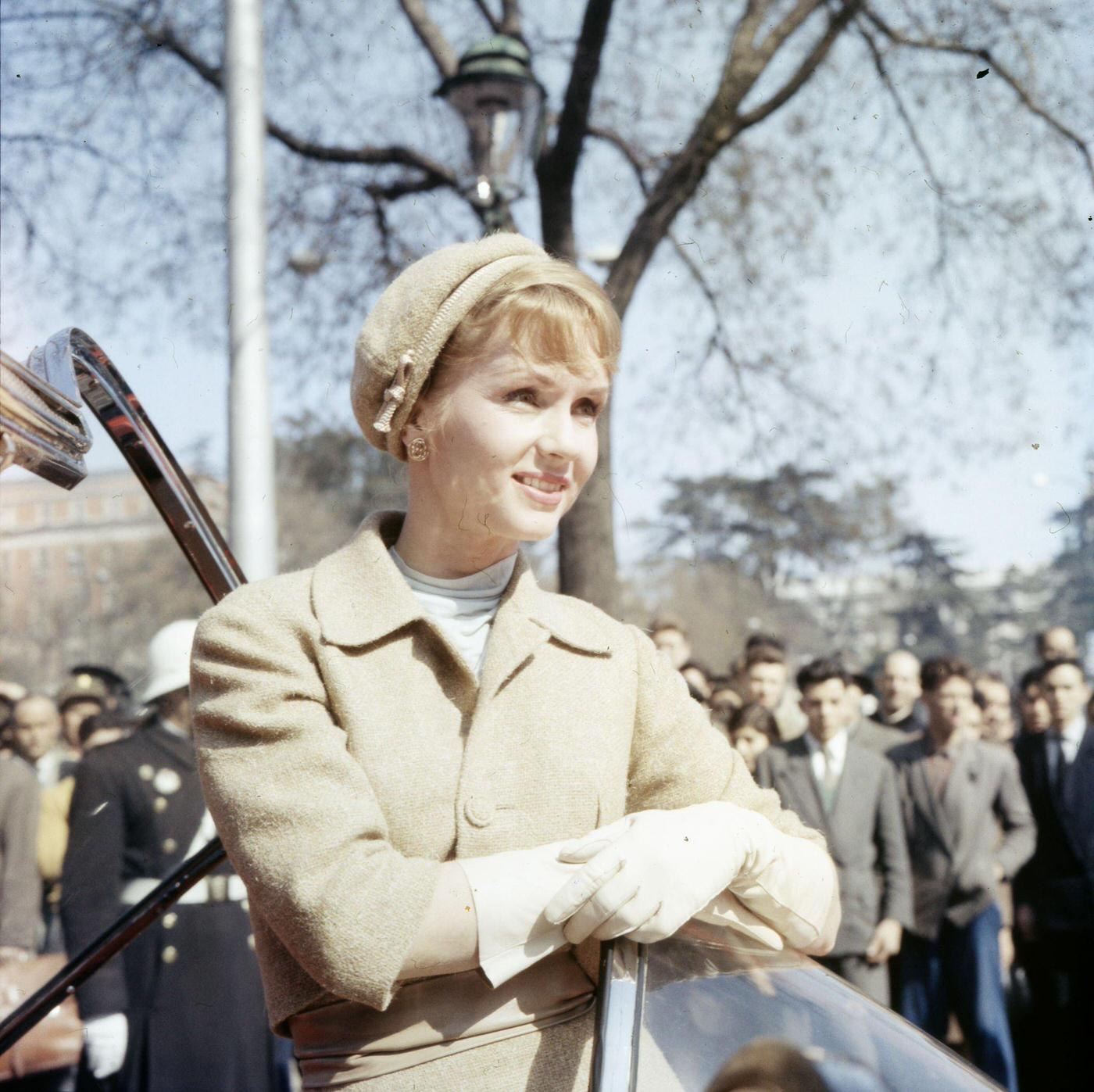 Debbie Reynolds entering a car while filming ‘It Started With A Kiss,’ Madrid, Spain, 1958