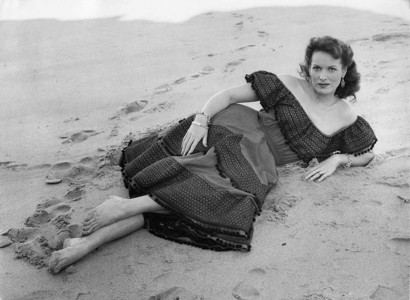 Maureen O'Hara on the beach, Lisbon, Portugal, 1955