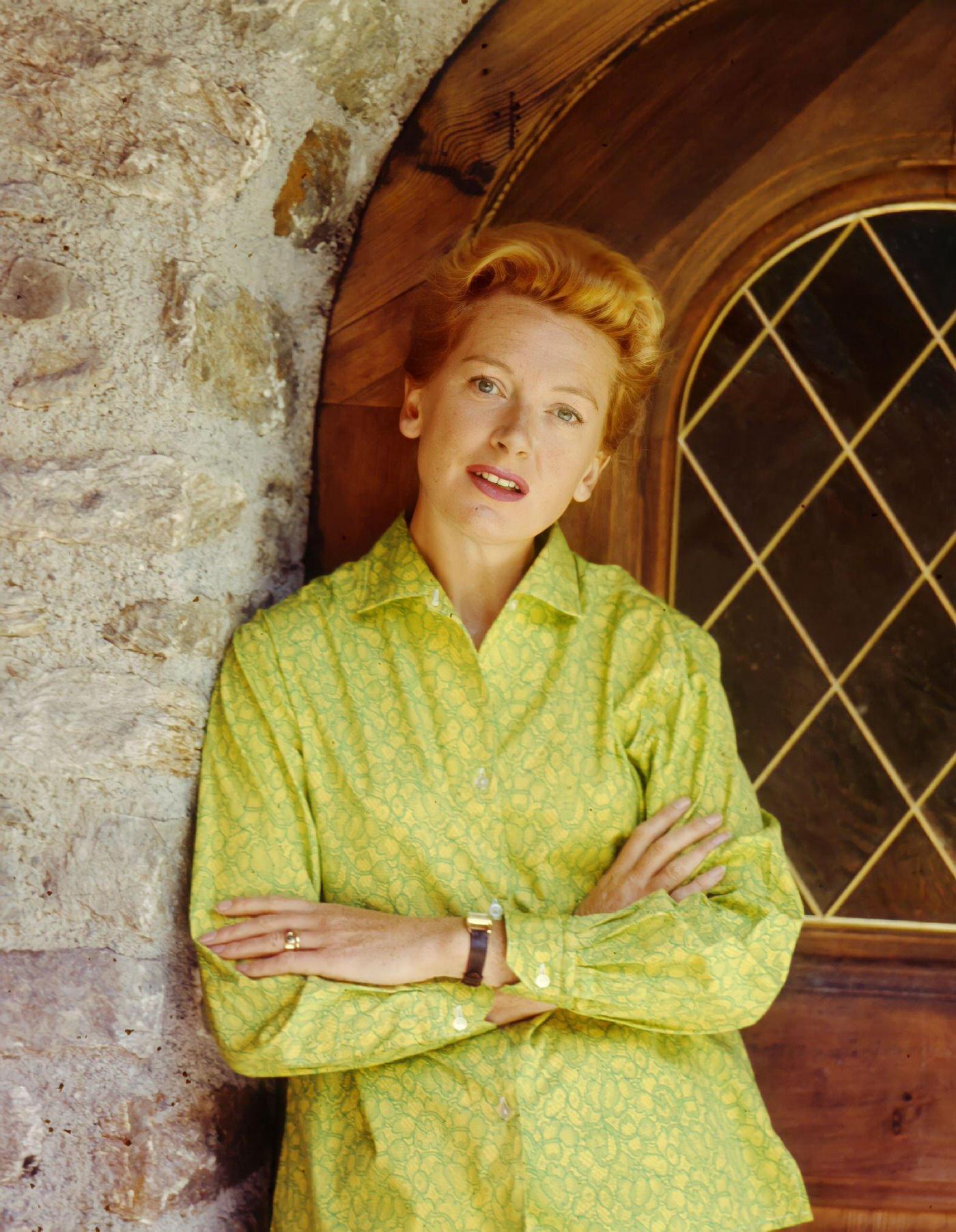 Actress Deborah Kerr poses for a portrait outside her residence in Los Angeles, California, 1956.