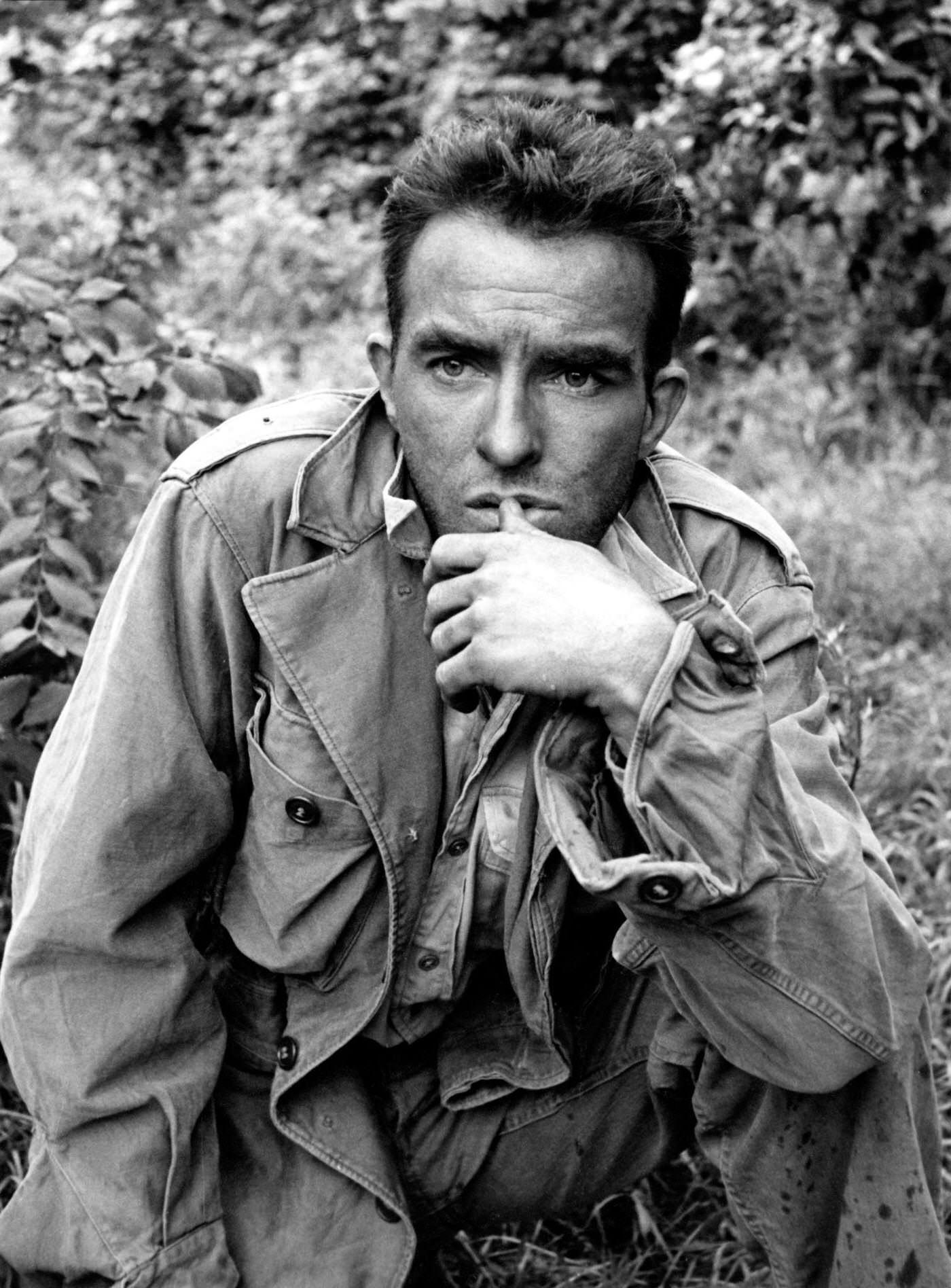 Actor Montgomery Clift poses for a portrait while shooting "The Young Lions" at the Natzweiler-Struthof Concentration Camp in France, 1957.