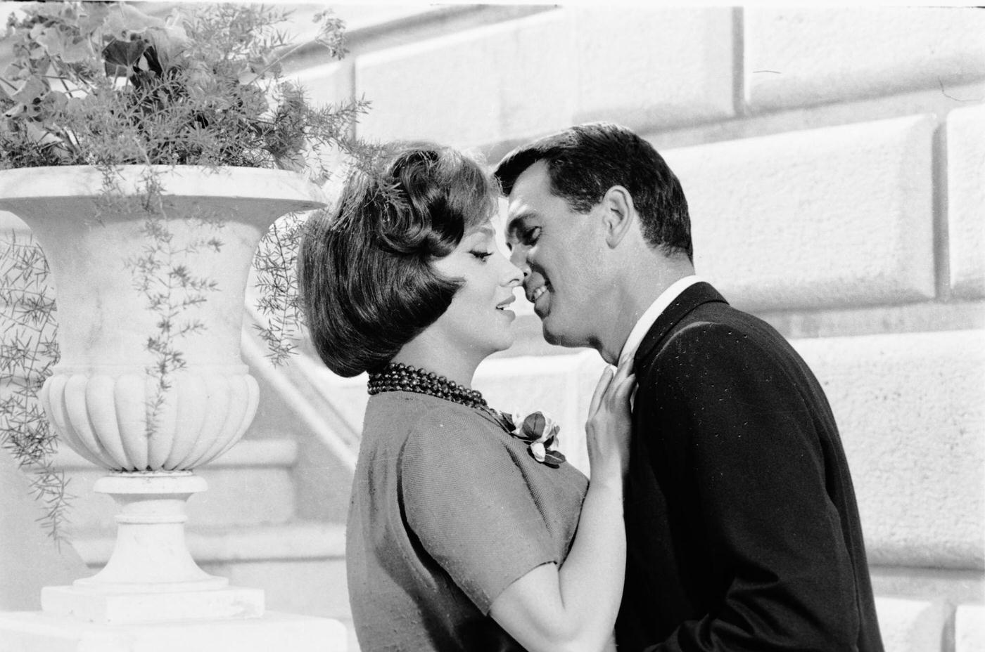 Rock Hudson kisses Gina Lollobrigida in a scene from "Come September" in Portofino, Italy, 1960.