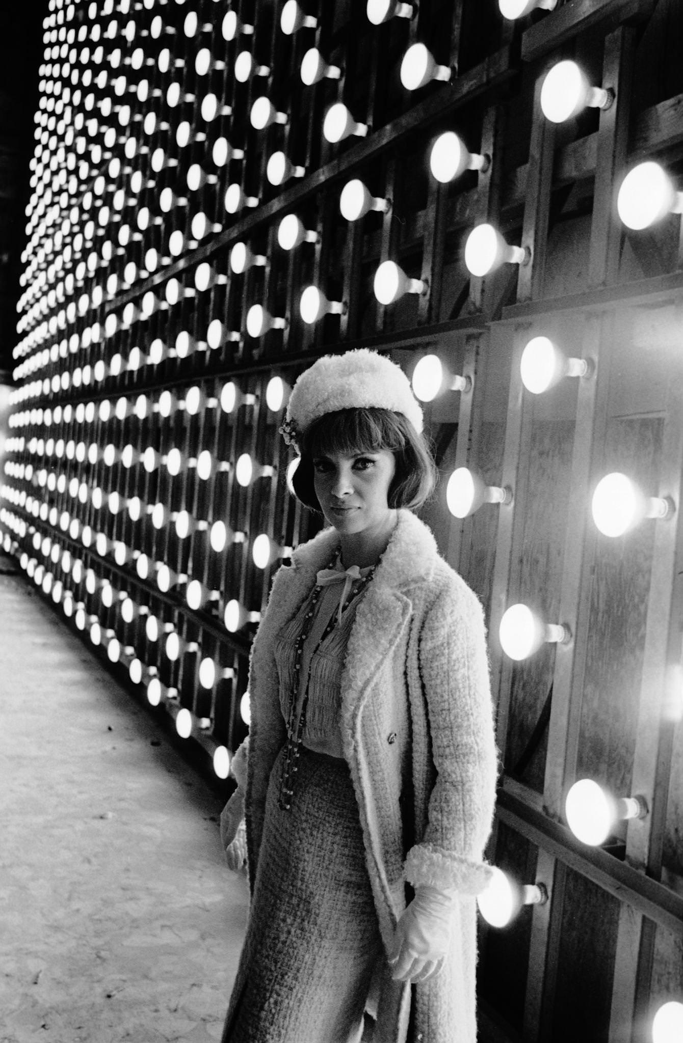 Gina Lollobrigida posing behind the set of "Come September" in Italy, 1960.