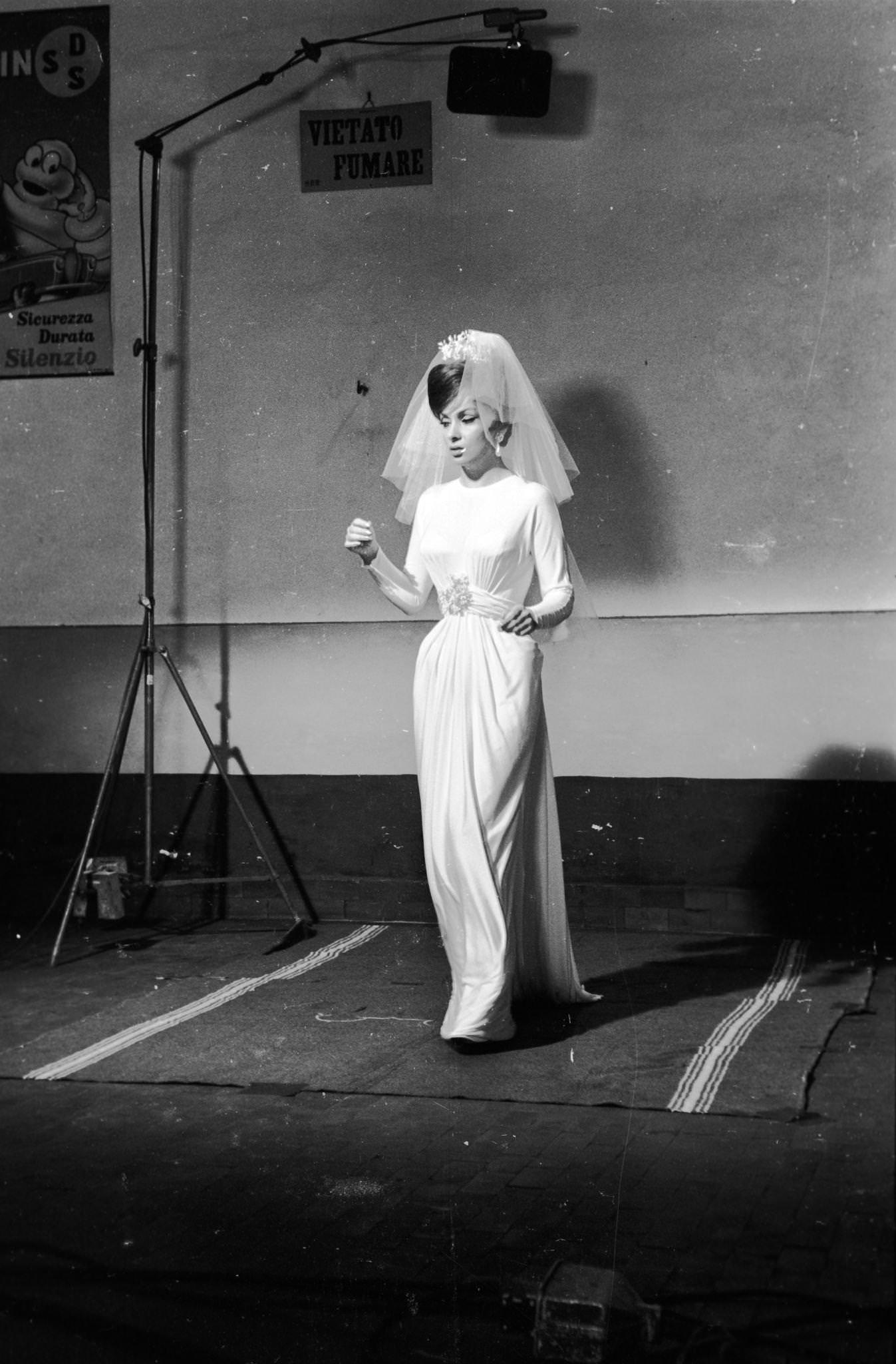 Gina Lollobrigida dressing as a bride for "Come September" in Roma, Italy, 1960.