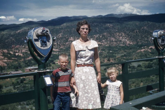 Lady and Two Children Posing with Fixed Coin-Binoculars, Circa 1950s