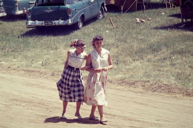 Two Girls Walking and Locking Arms, Probably Iowa, Circa 1950s