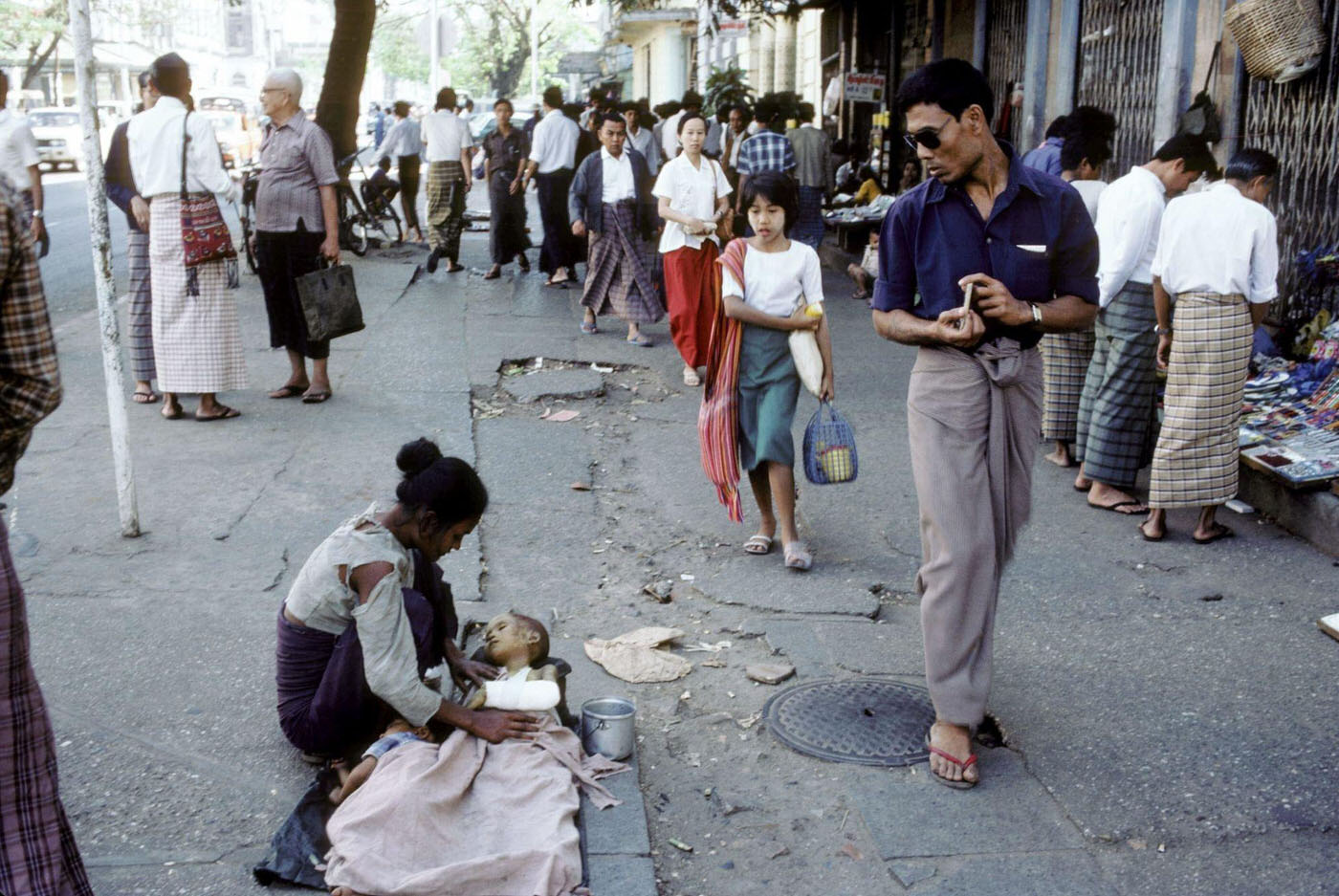 Mother with Sick Child Begs on the Streets of Rangoon, Burma, 1985