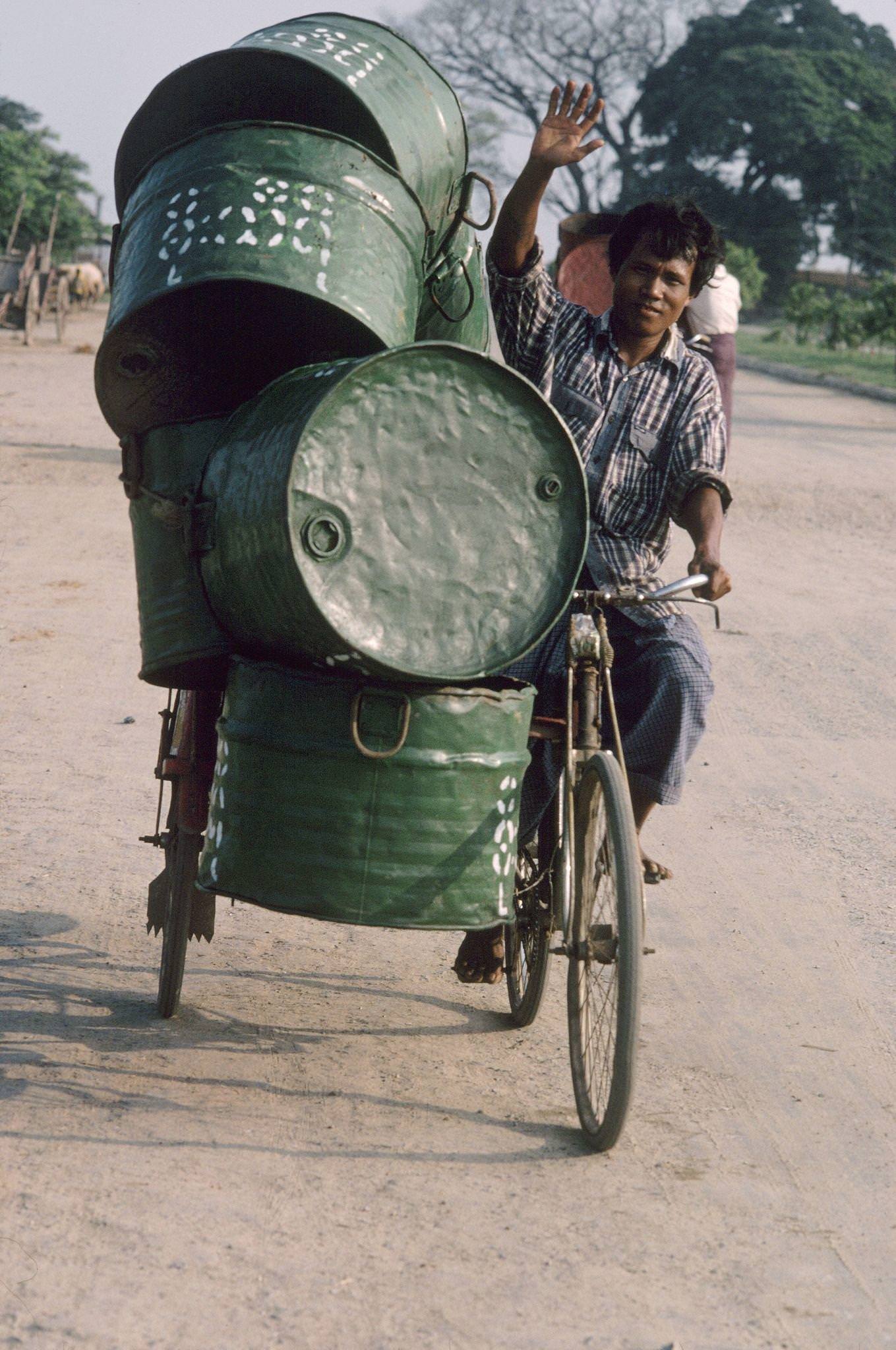 Mandalay, Myanmar - Man Going to Mandalay Market with Jerrycans, 1980s