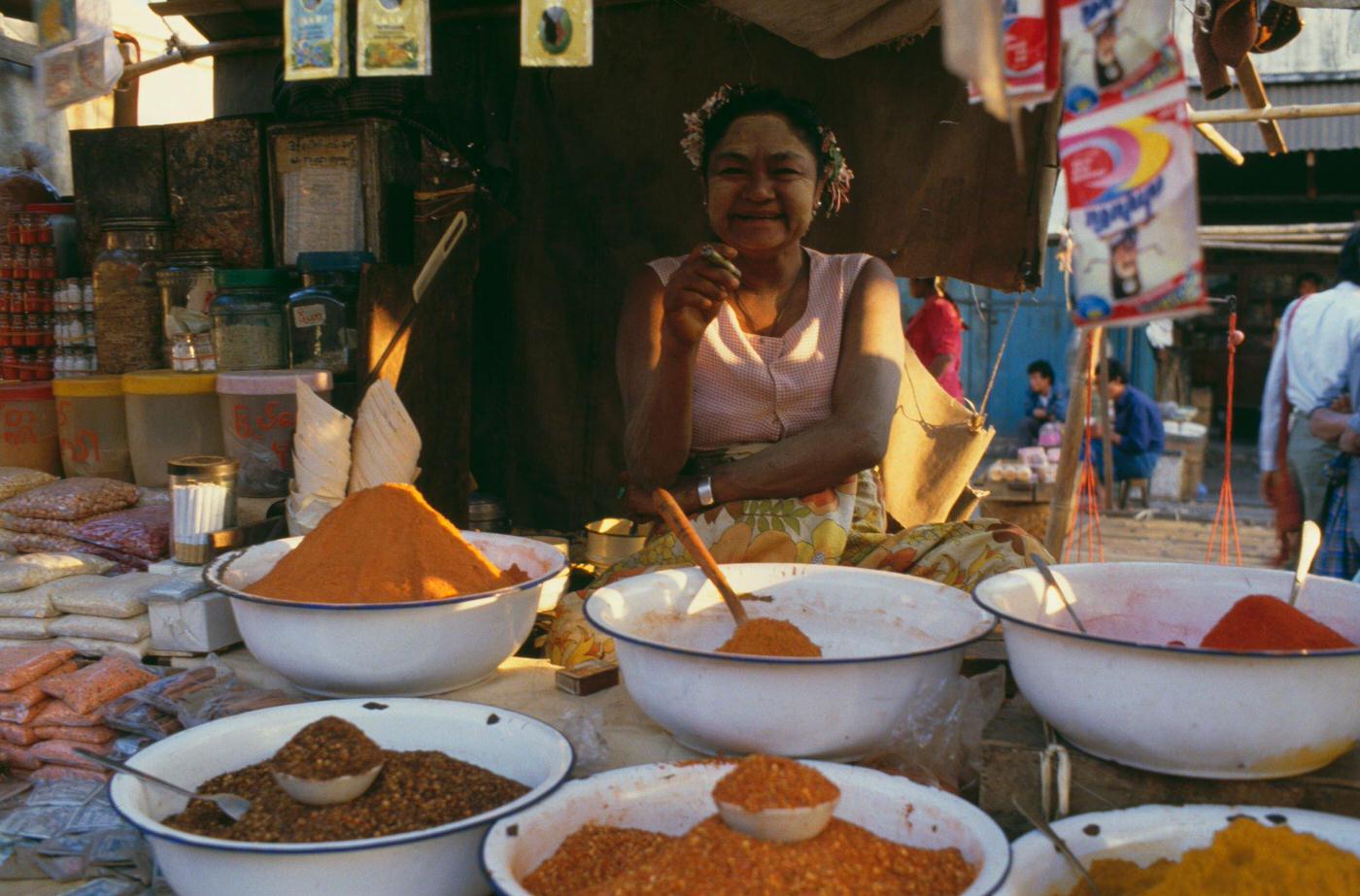 A Spice Seller with Her Wares at a Market in Myanmar, 1988