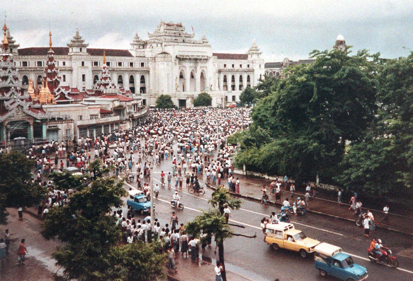 Demonstrators gather in central Rangoon to protest against the government, Myanmar, 1988.