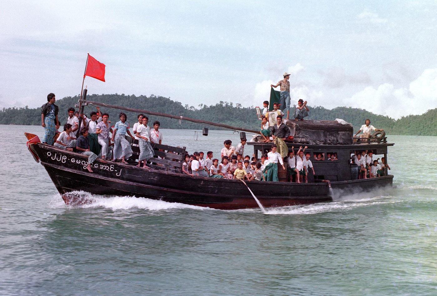 Burmese demonstrators on their way to Victoria Point, an area controlled by anti-government protesters, 1988.