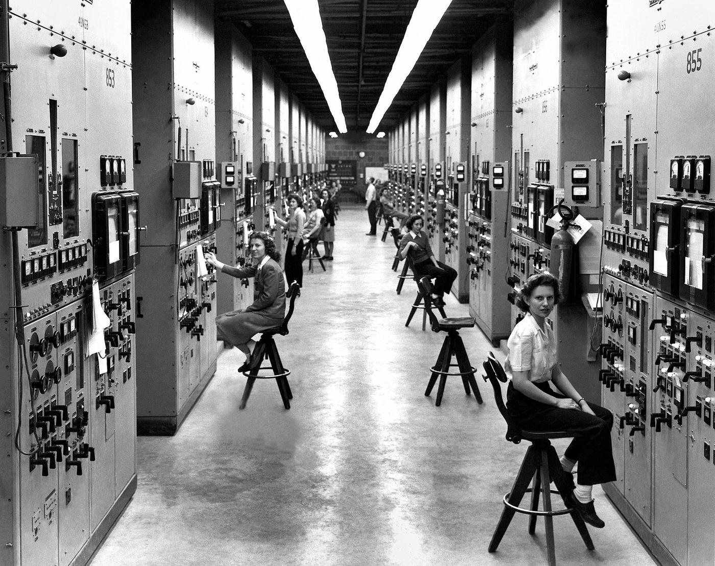 Calutron Operators at Y-12 Plant, Oak Ridge. 1944. The calutrons refined uranium ore. Secrecy shrouded workers' efforts. Tennessee.